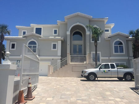 Freshly painted fleming island home exterior in morning light